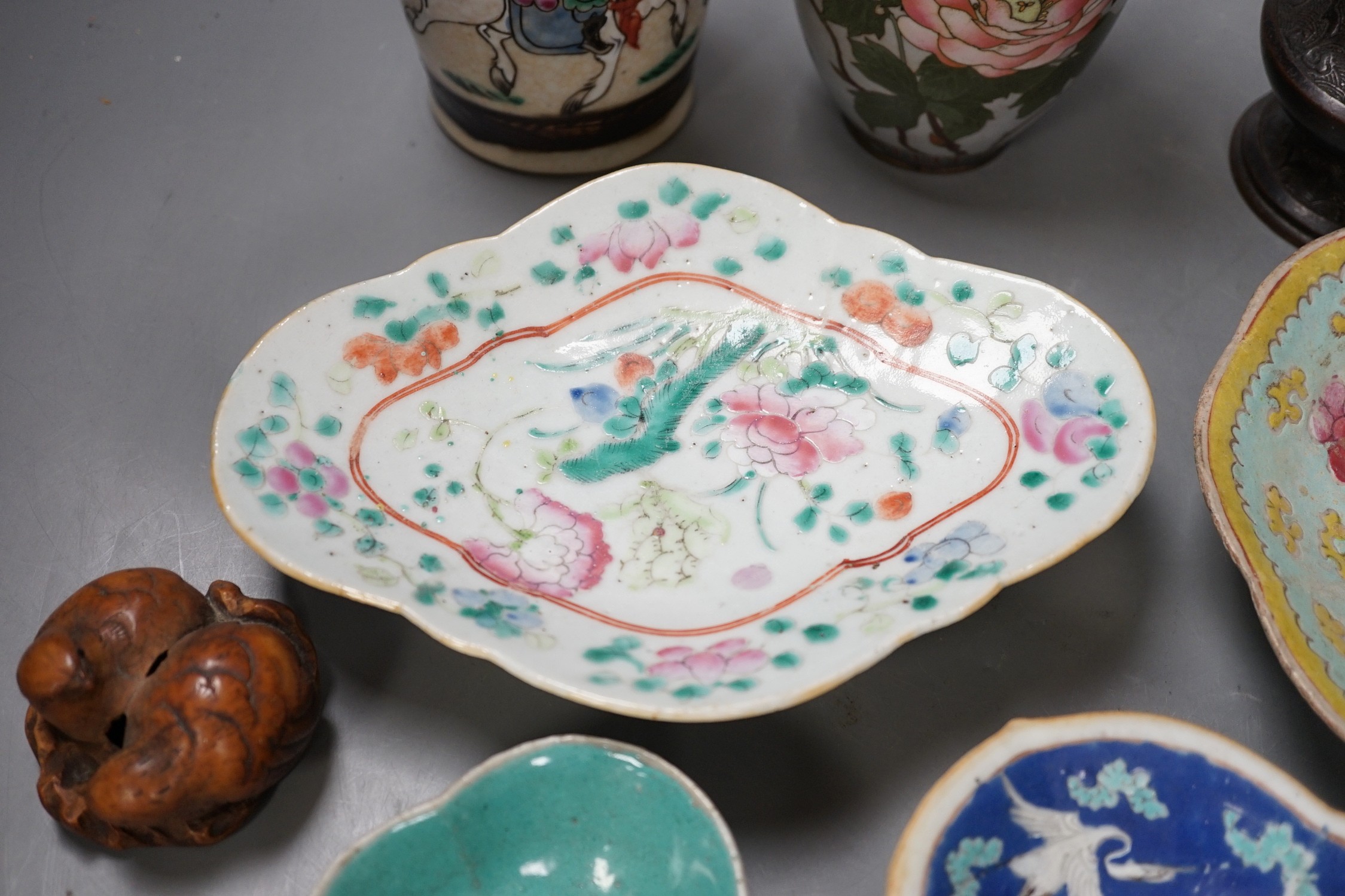A group of 19th century Chinese porcelain dishes and a vase, and a Japanese ‘bird’ carving etc.